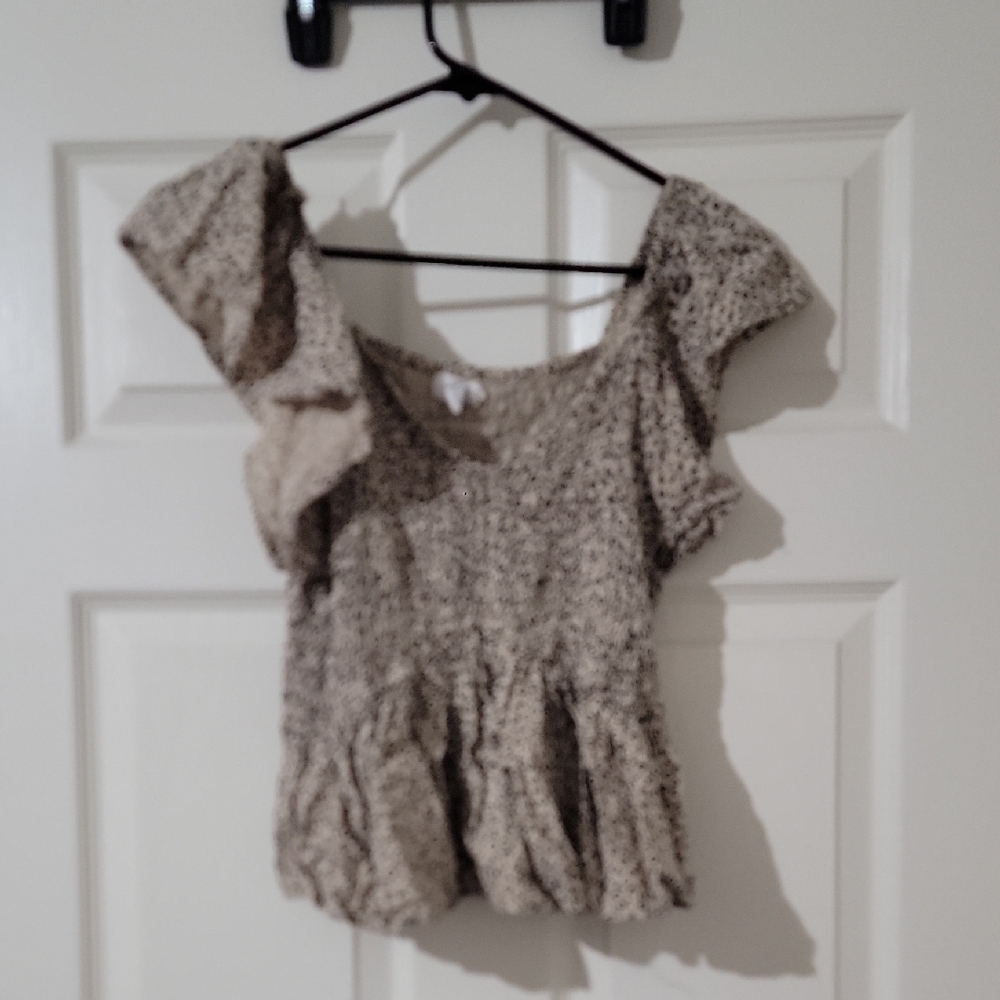 Cream Smocked Peplum Blouse with Ruffled Sleeves